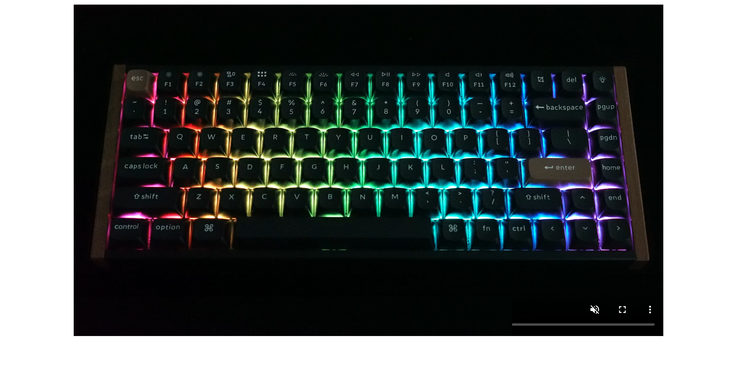 Keychron promotional image of the K2 HE with a rainbow per-key backlight on a dark background